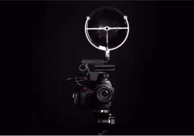 Sound Shark long-range microphone mounted on a video camera