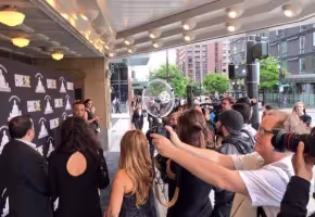 Sound Shark long-range microphone being used on a DSLR camera at a red carpet event