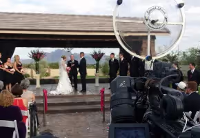 Sound Shark long-range microphone being used on a video camera at an outdoor wedding