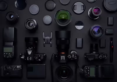a collection of cameras and lenses